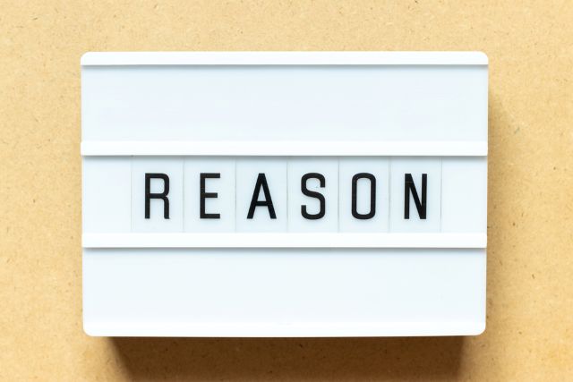 REASONと書かれたボード